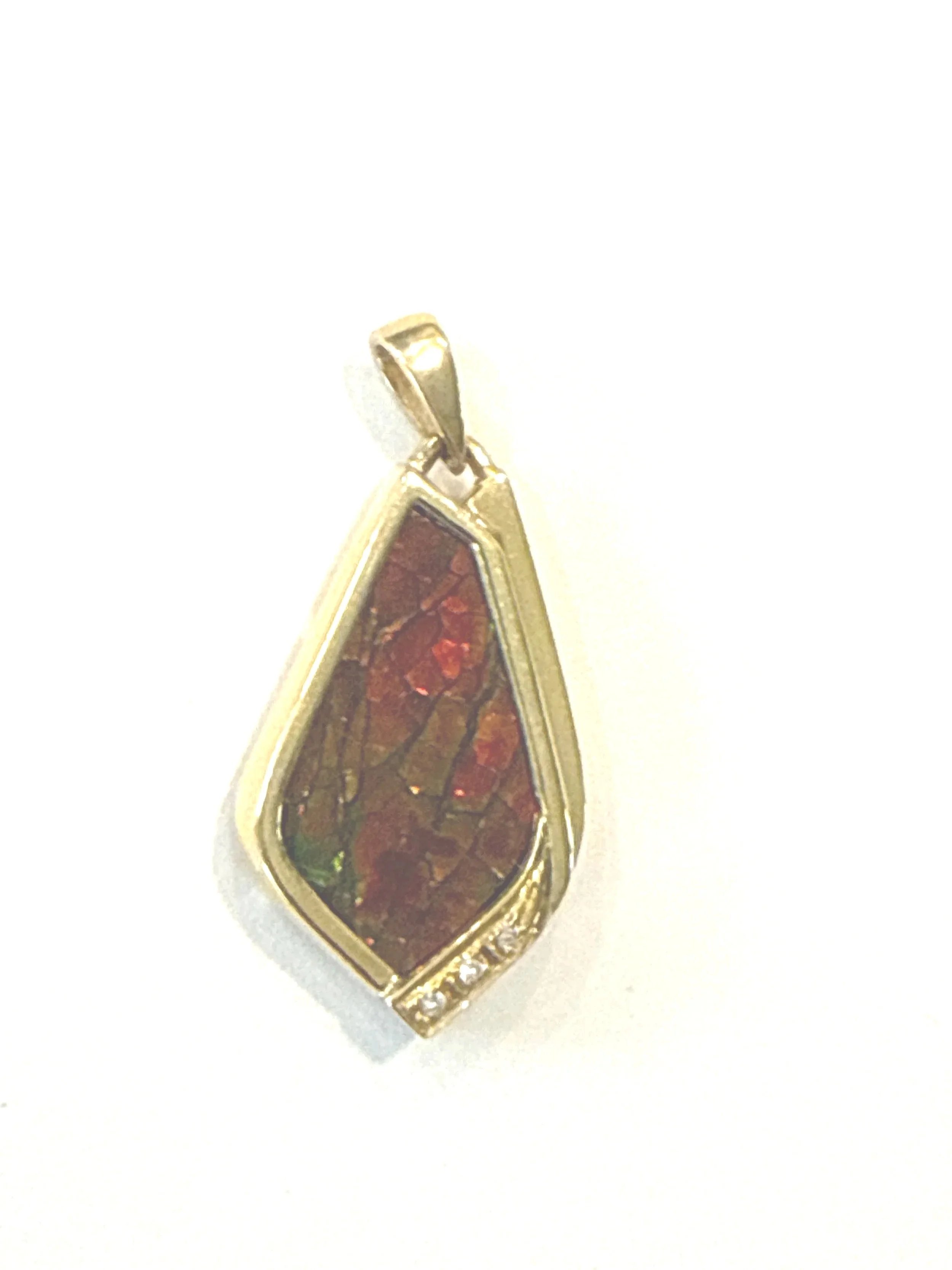 259.  Lady's custom, polished 18K yellow gold, ammolite and diamond pendant, 7.33 grams, stamped 18K, excellent condition.  Appraisal Certificate included Value $3590.