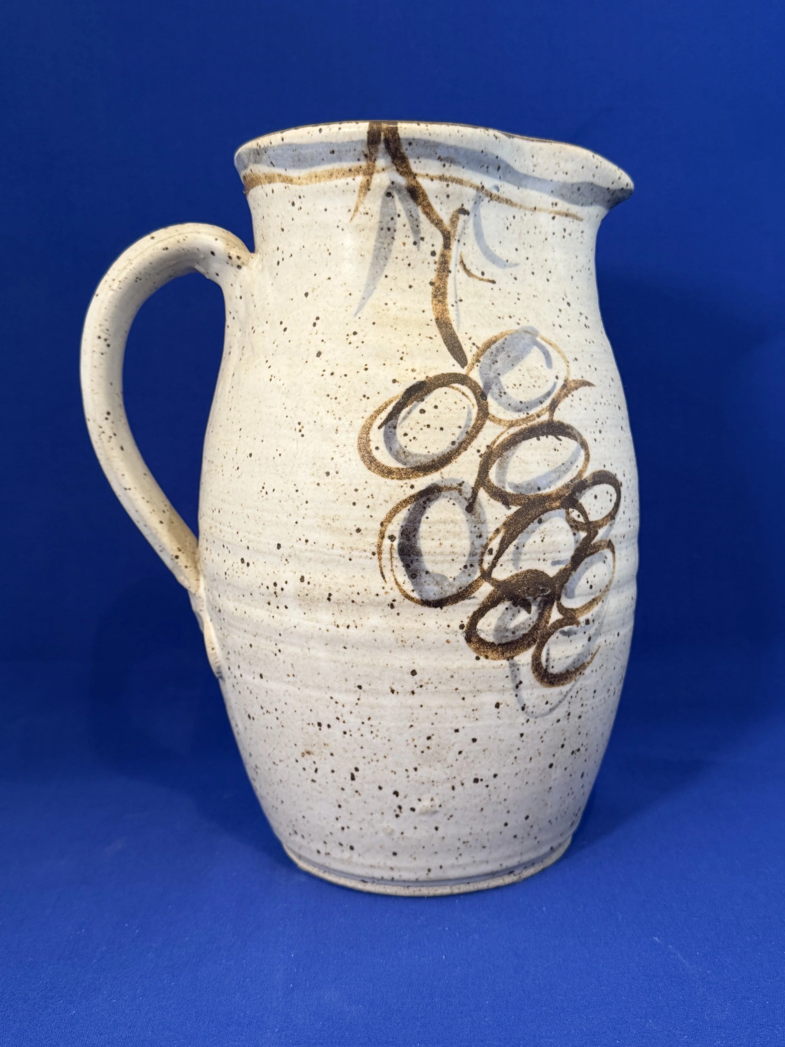 135.  Pottery pitcher, 10"T