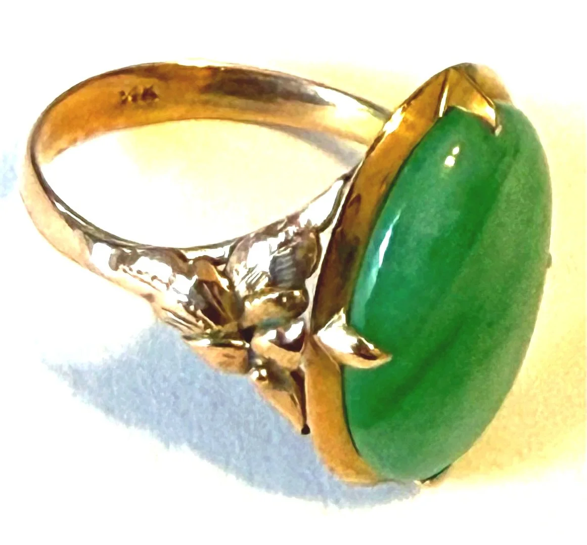 248.  Lady's textured & polished 14K yellow gold, jadeite dinner ring, size 5.5, 2.76 grams, stamped 14K, in good condition. Appraisal Certificate included Value $1200.