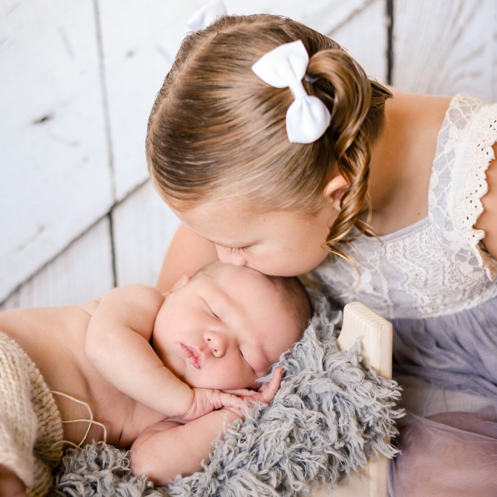 Baby and Sister at Newborn Photography Studio