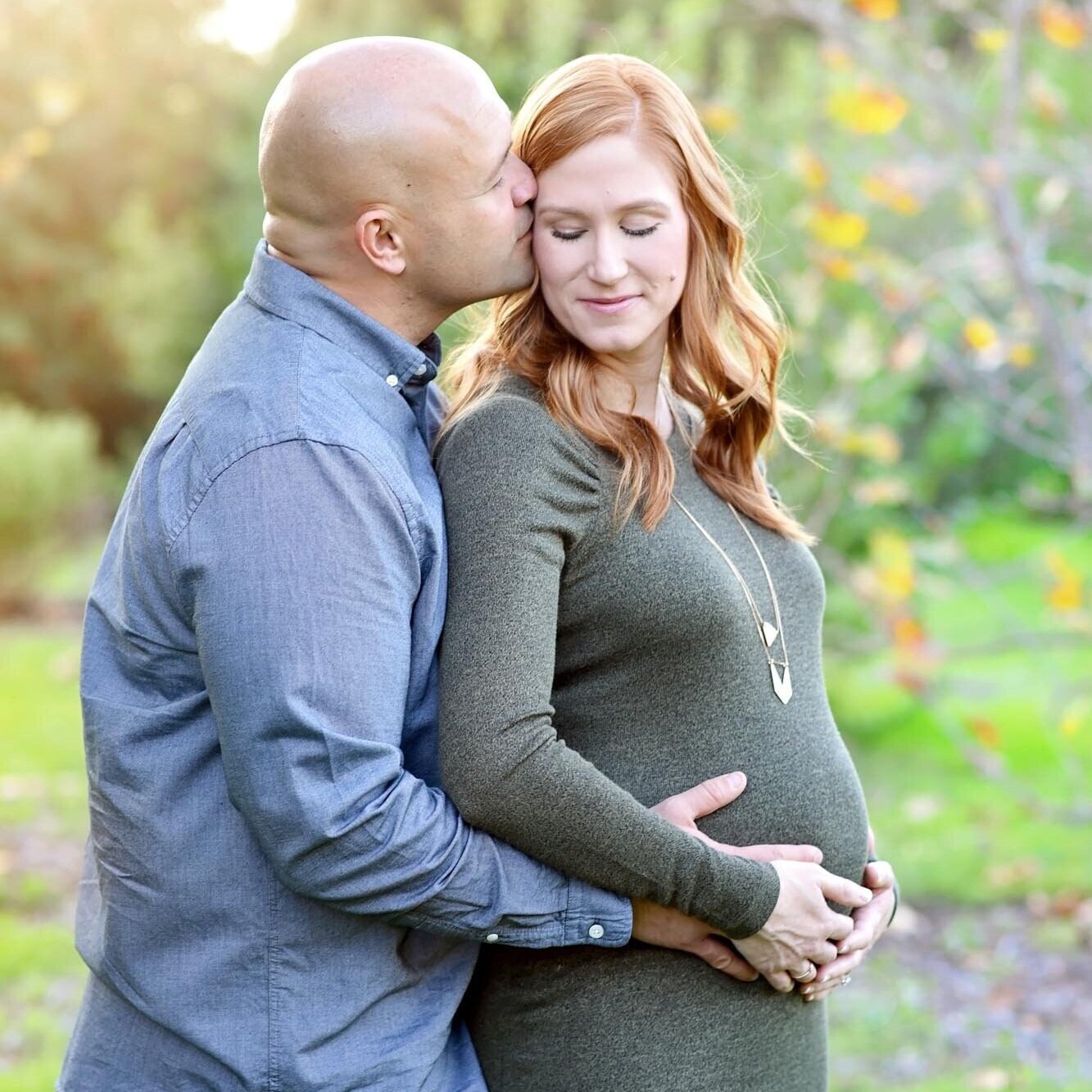 Couple holding hands for maternity photography in Orange County CA