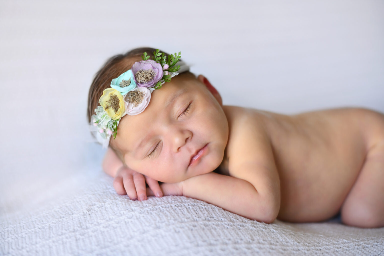 Newborn baby girl at photography studio in Orange County CA