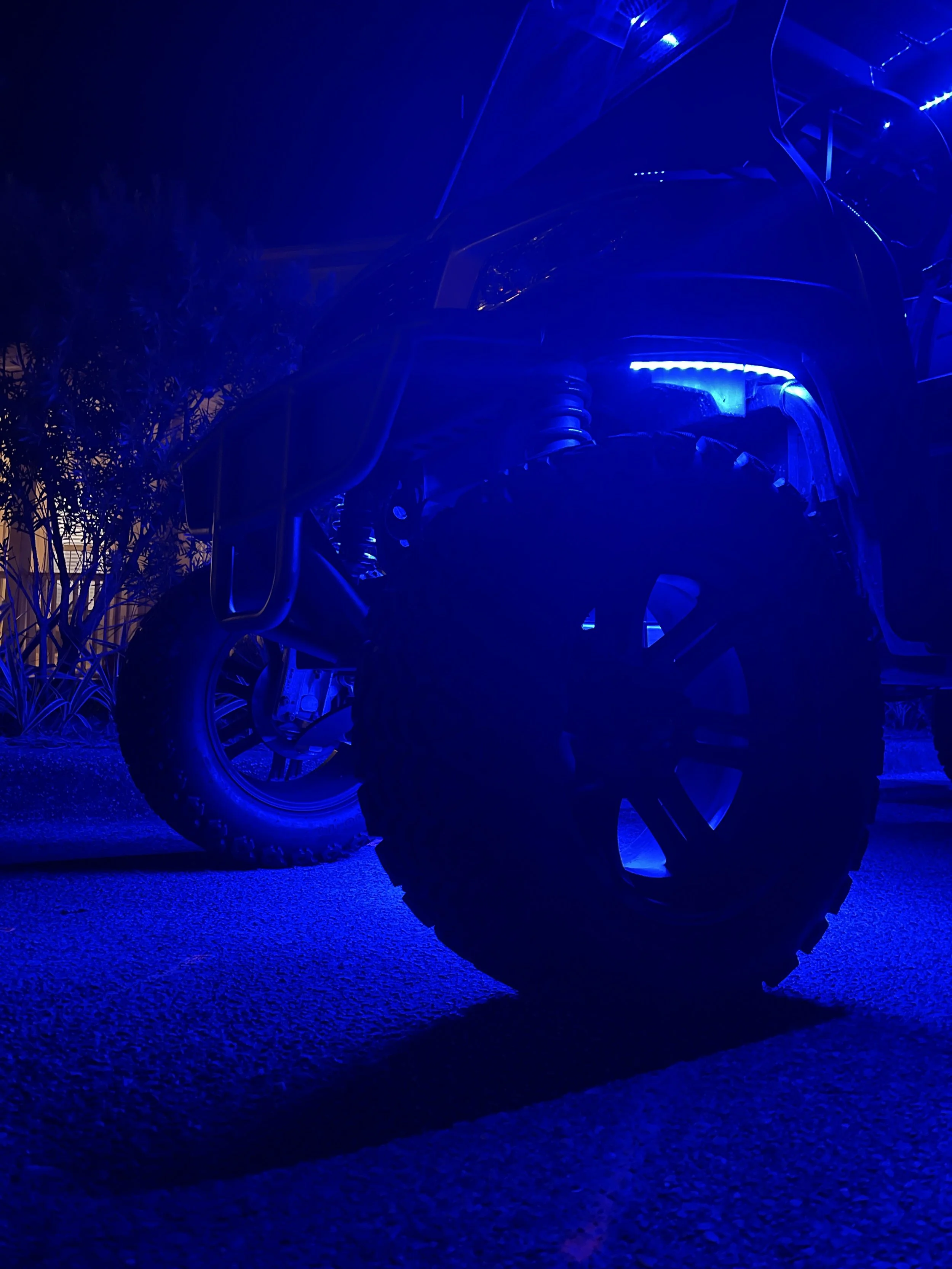Lifted Cart Wheel Close Up Blue Glow.JPG
