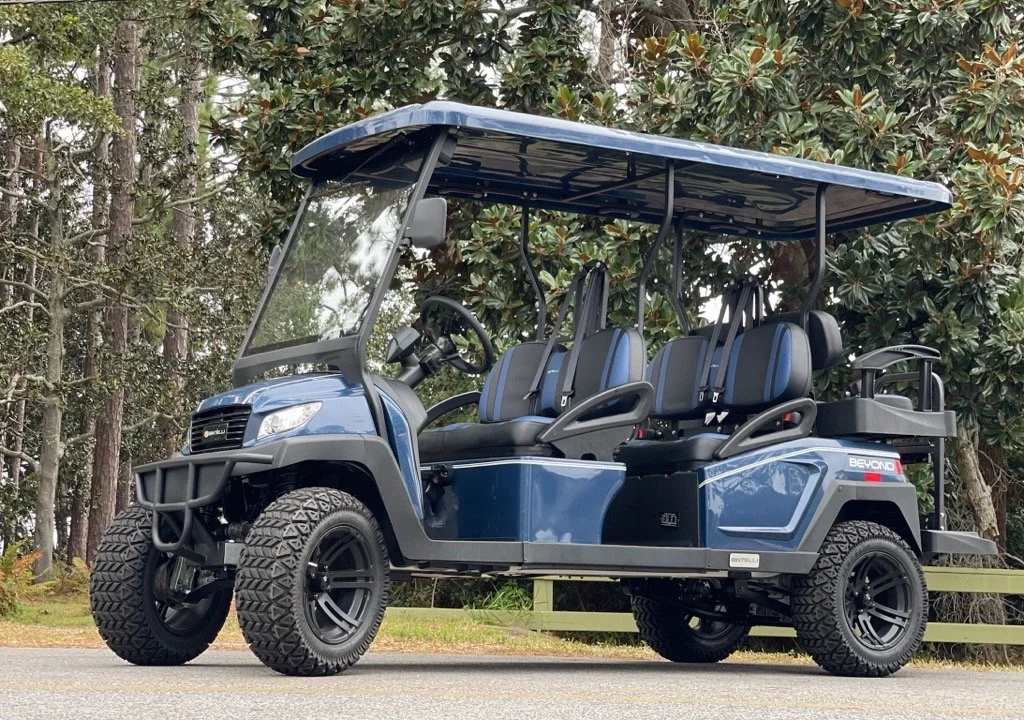 LNB08L navy blue lifted 6 seat electric street legal golf cart LSV on the Emerald Coast
