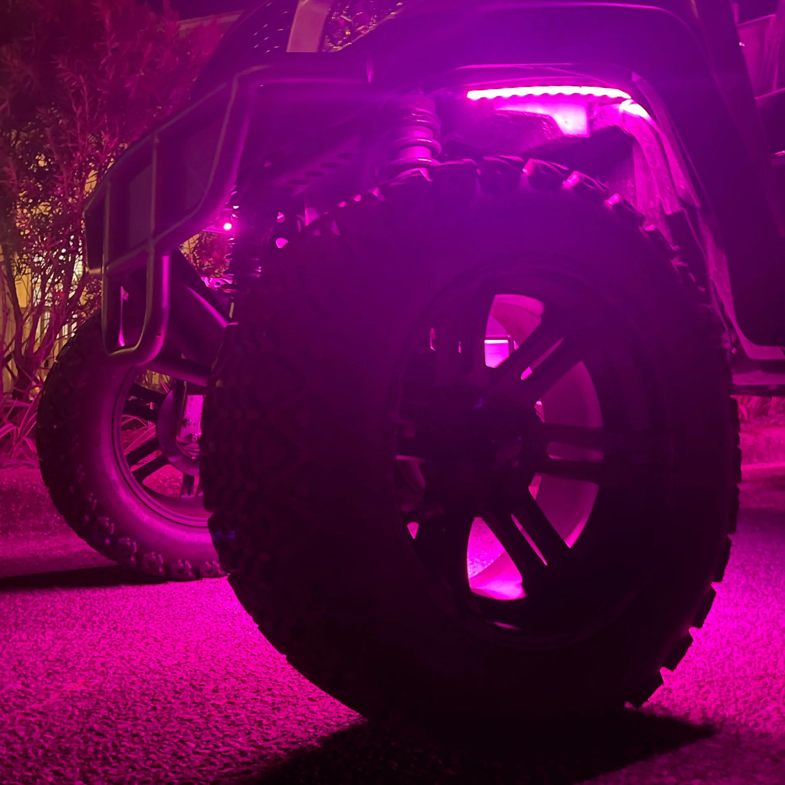 Lifted Cart Wheel Close Up Purple Glow.JPG