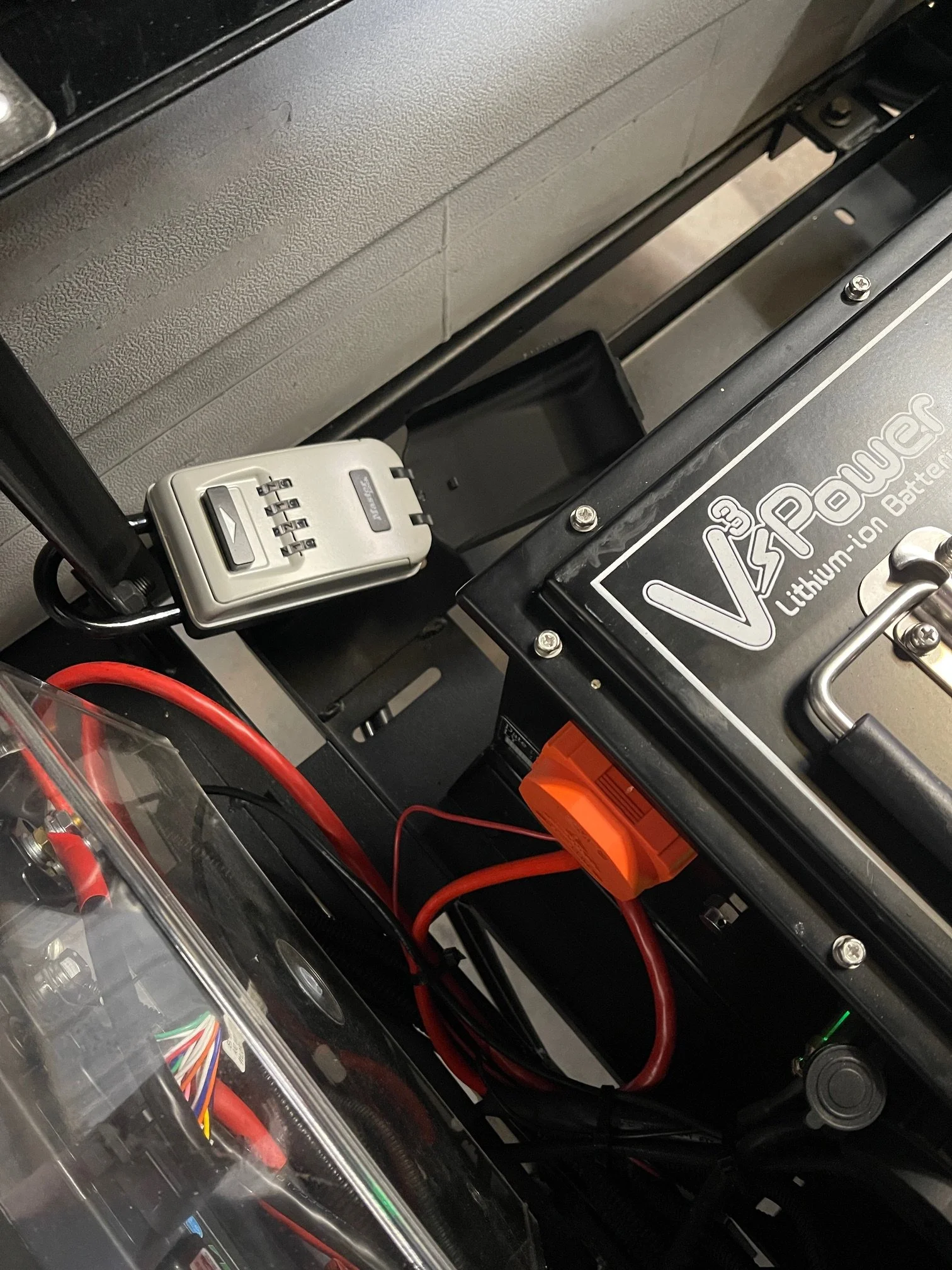 VCarts Lock box under middle row seat next to battery closer up 3.JPG
