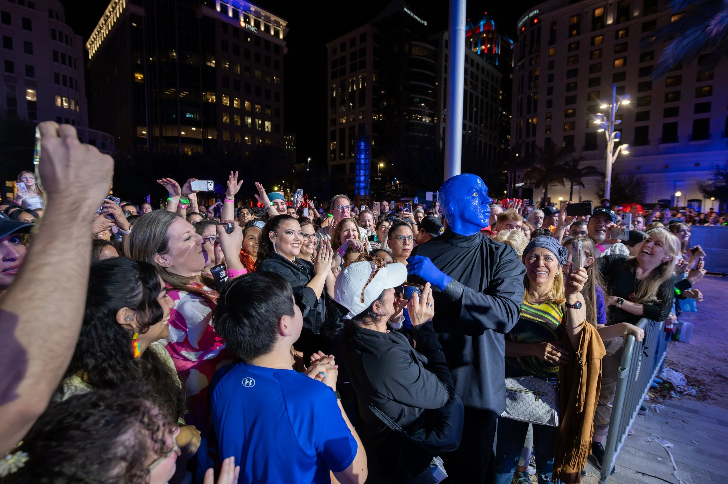 Blue Man Group is in the crowd at IMMERSE in the street of Downtown Orlando