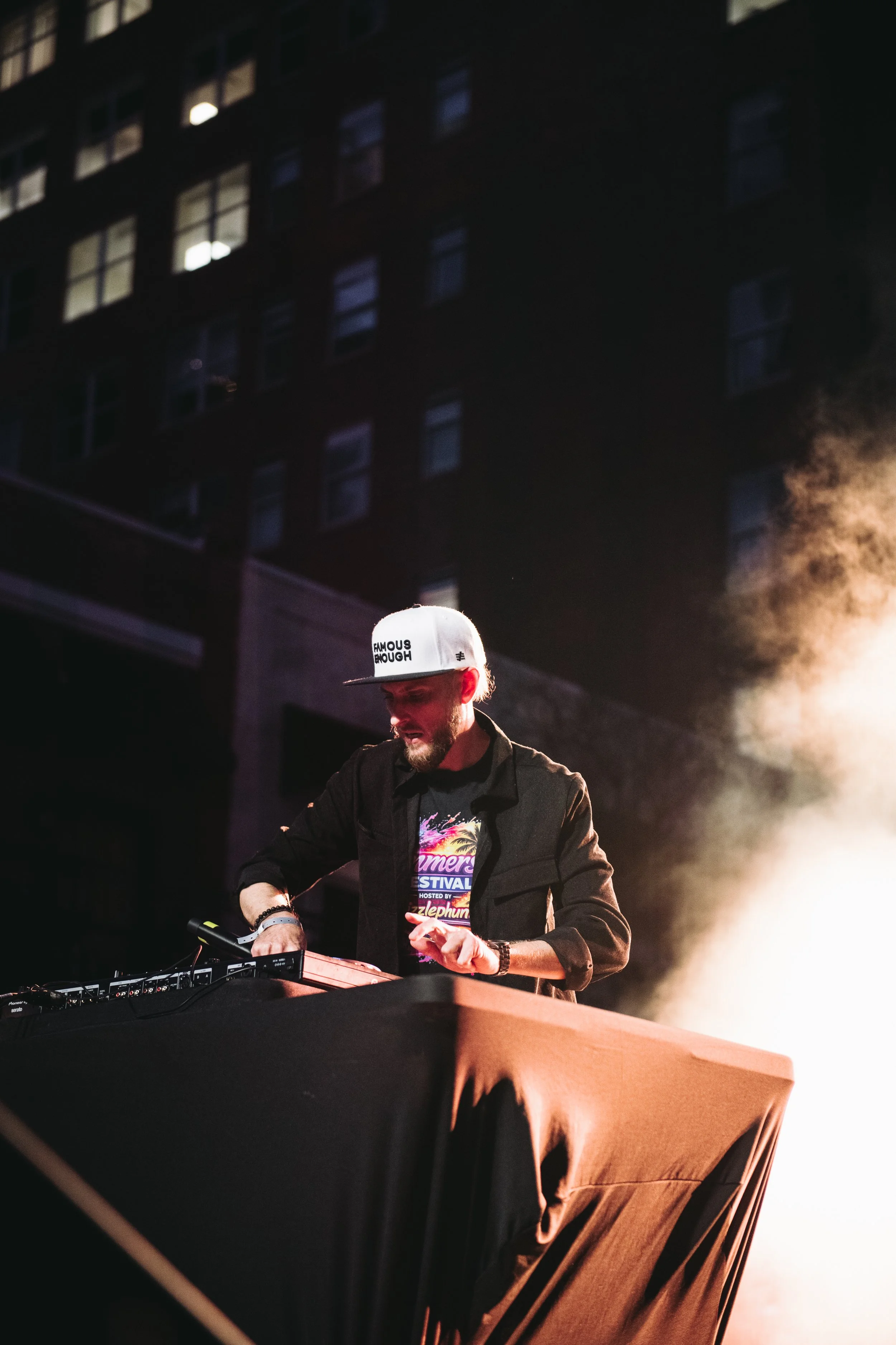 DJ Dizzle Phunk hosts and DJs on stage at IMMERSE