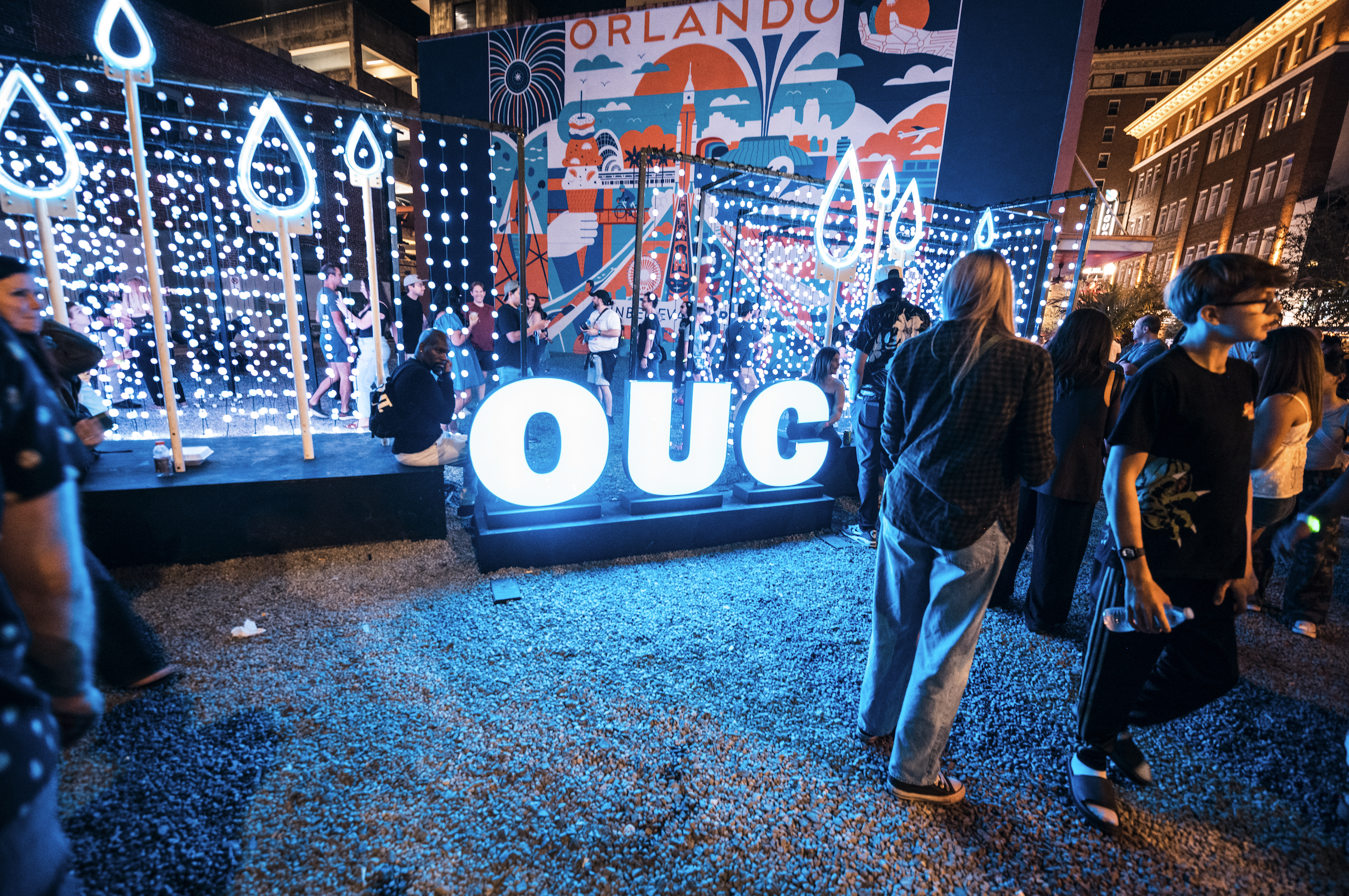 Guests interact with the OUC Light installation at IMMERSE in Downtown Orlando
