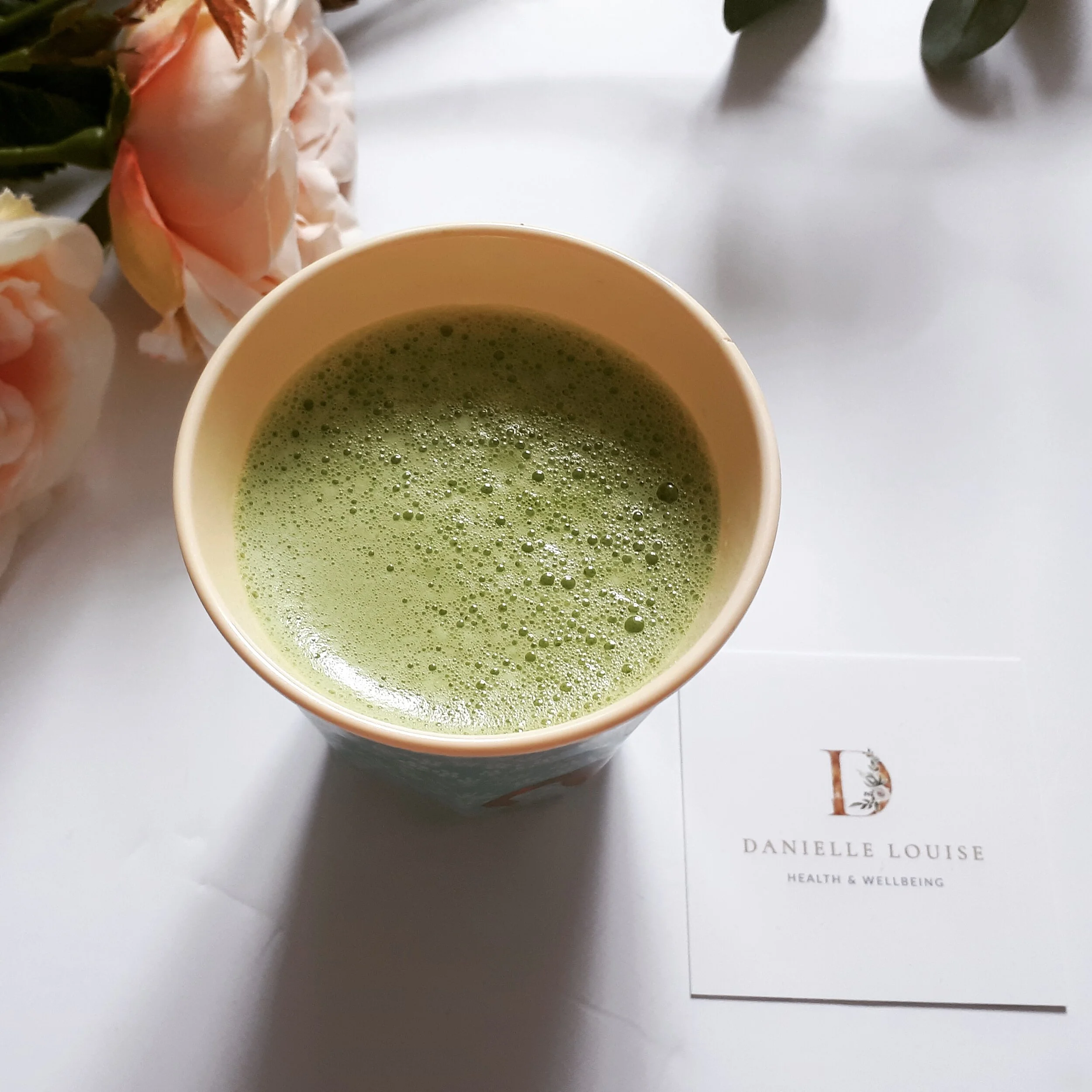 Me enjoying my morning wheatgrass juice with apple juice.