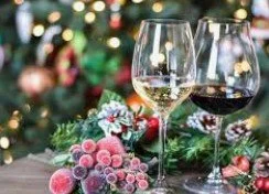 Glasses of wine with holiday decor