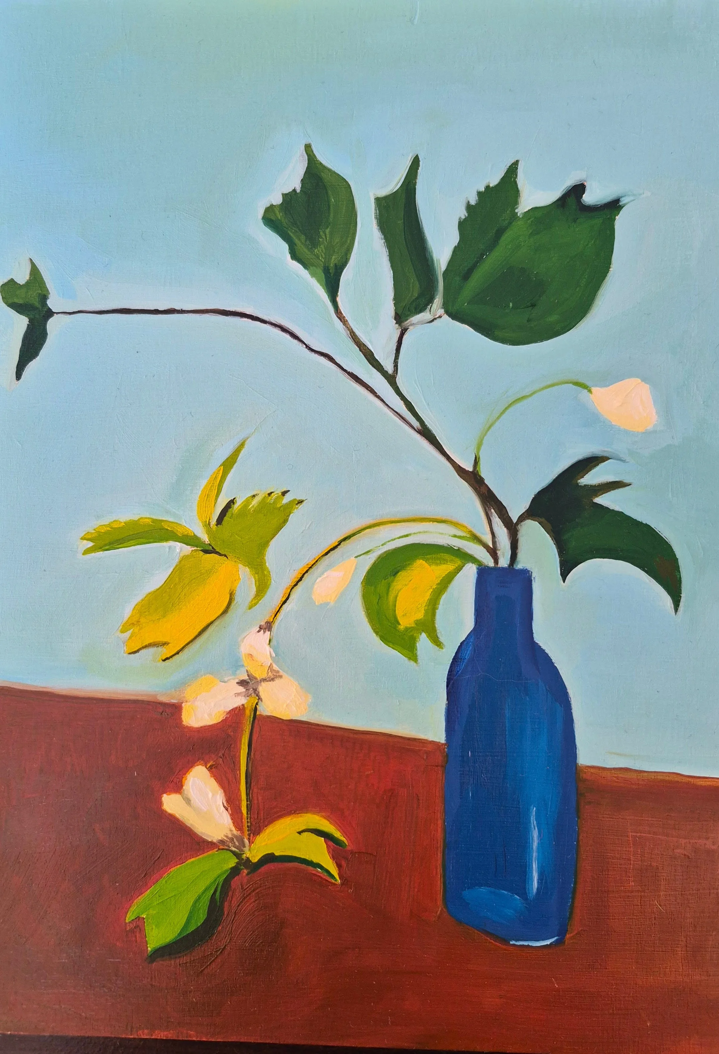 Painting of a green vine with leaves and flowers in a blue vase on a wooden surface, set against a light blue background.
