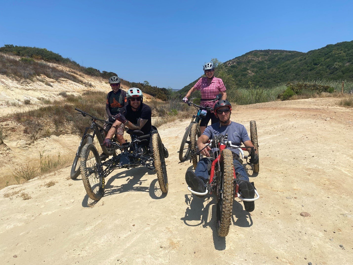 Meeting adaptive cyclists on the trail in PQ