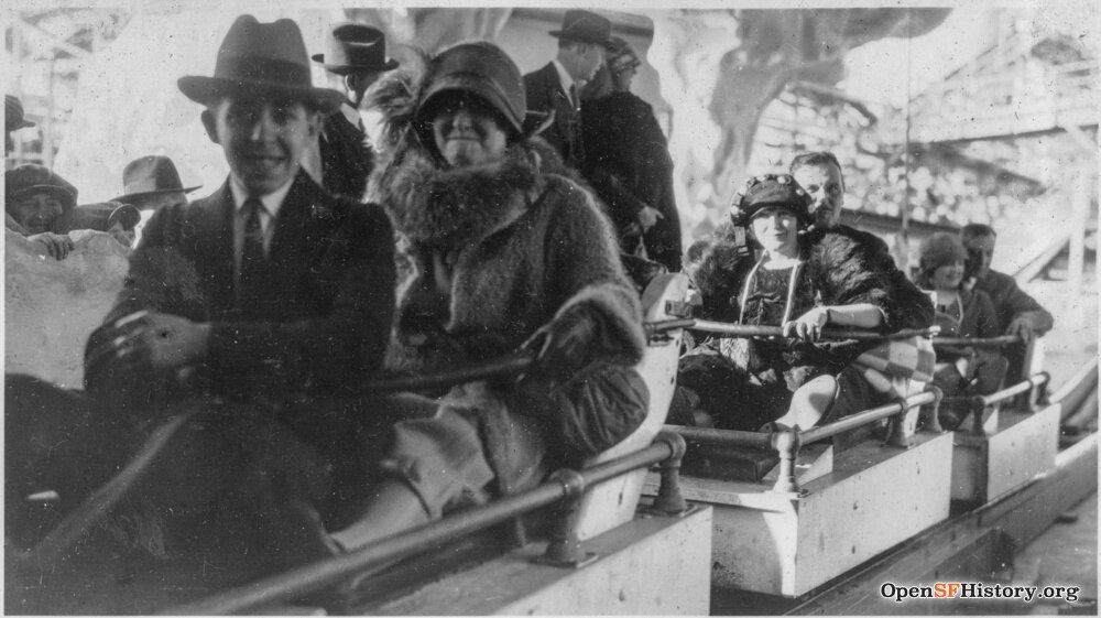 Men and women on a rollercoaster at Playland