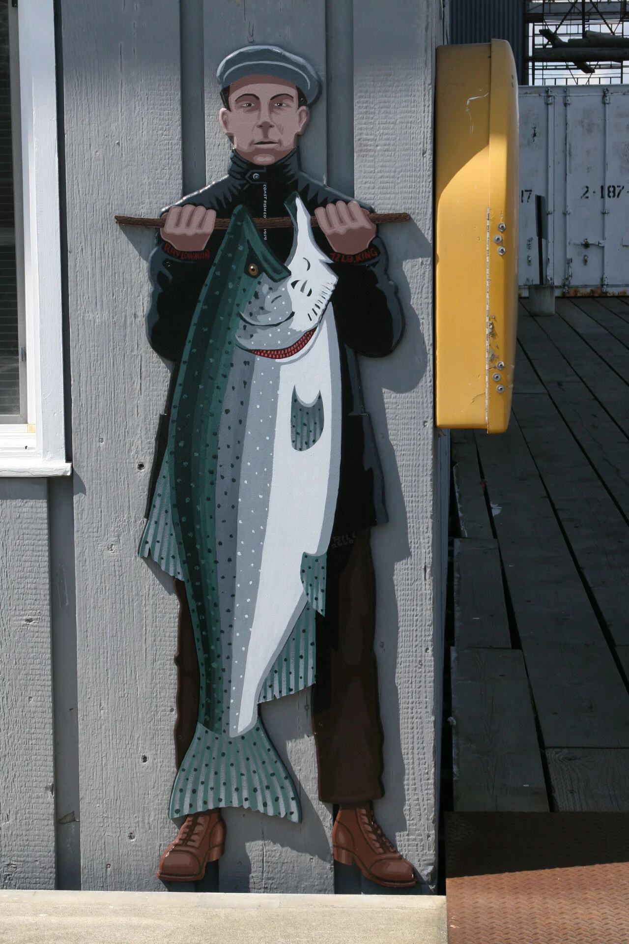 Ray Lowman and 72 lb. King, at his Dad’s cannery, 1917