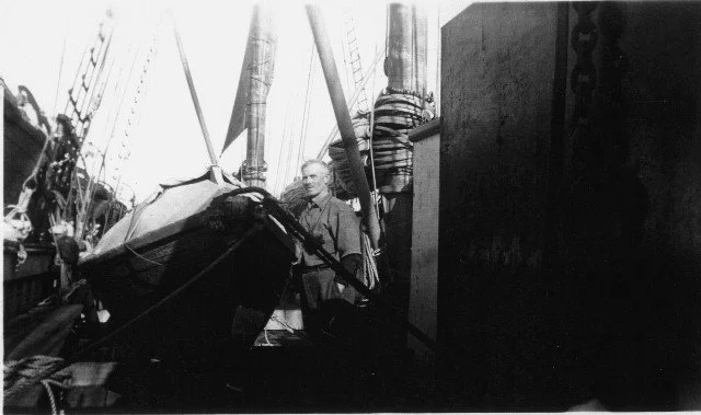  B. S. (Charlie) Johnson by his dory; WAWONA; Photo by David Wright  —  Anacortes Museum Historical Archive  