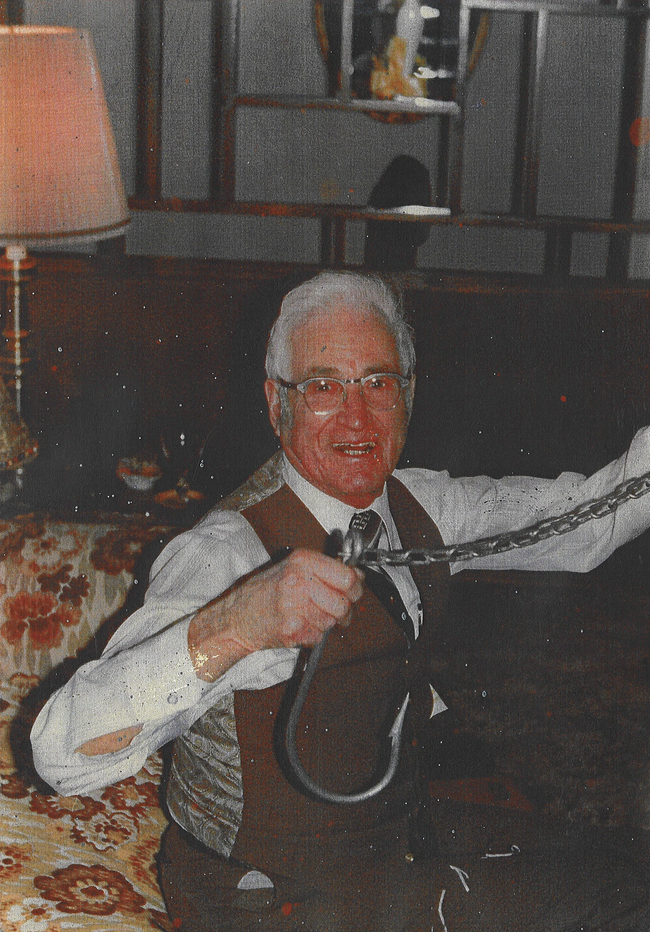 Bill Bessner with shark hook.