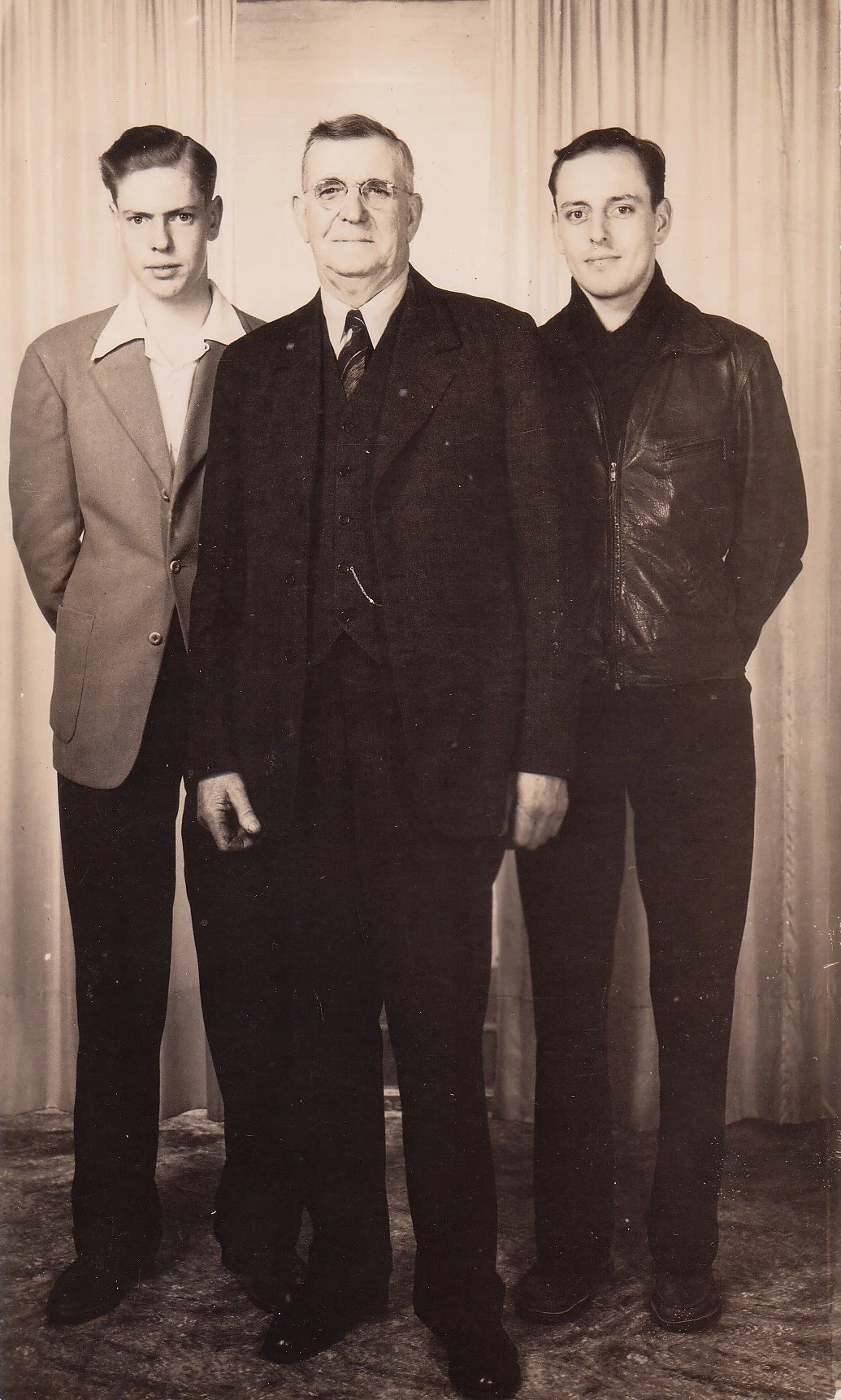  Richard H. Dildine is shown with his sons Richard and Bill.  The father operated Central Furniture Company at 1105 5th Street from c. 1926 to the mid-1940s; by 1940 the name had changed to Dildine's Furniture.  In 1937 he served as an Anacortes City