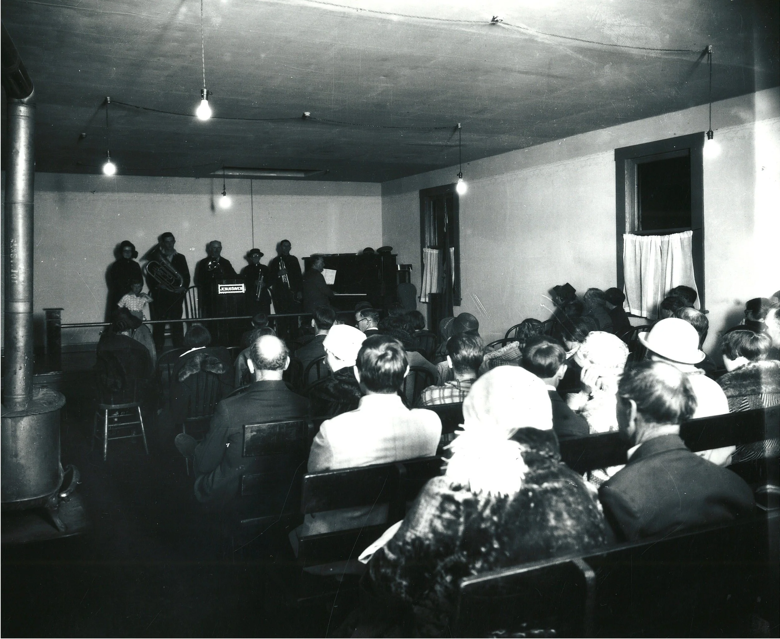  This is a photo of a meeting of the Salvation Army at 1102 4th Street.  -  Anacortes Historical Photo Archive  