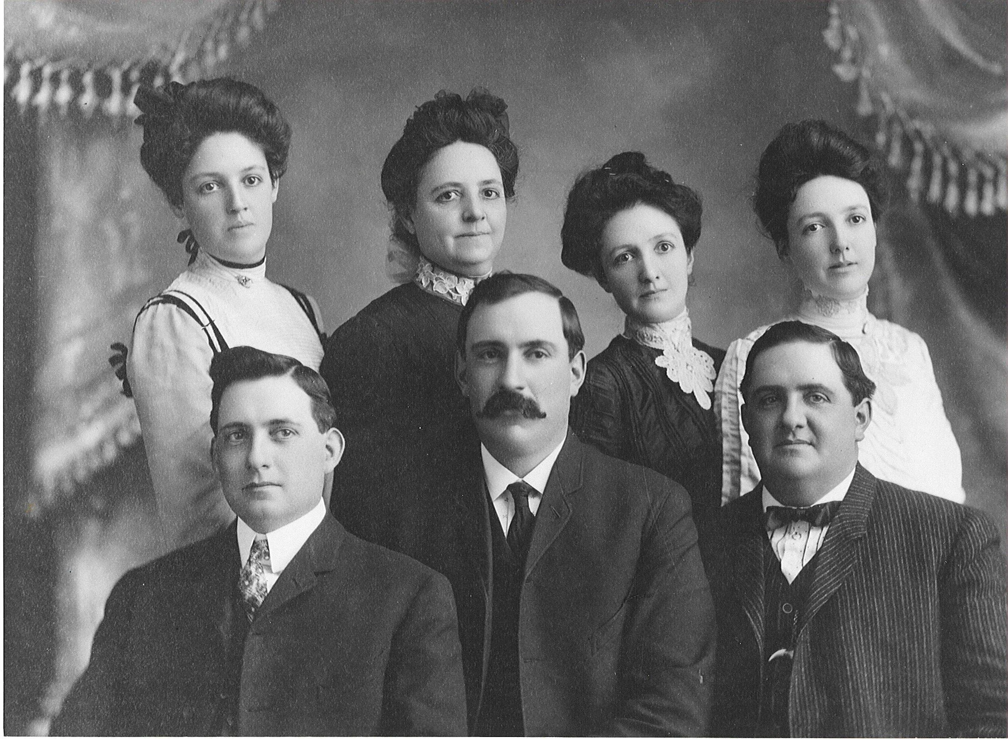  Photocopy of  Flora (mother, 2nd from the left) and her six children.   Back row, l to r : Mabel, Flora, Asineth (Sena) and Adelaide (Addie)  Front row, l to r:  Jeremiah (Jerry), Cepheus, and Wallis (Wally)  —  Anacortes Historic Photo Archive  