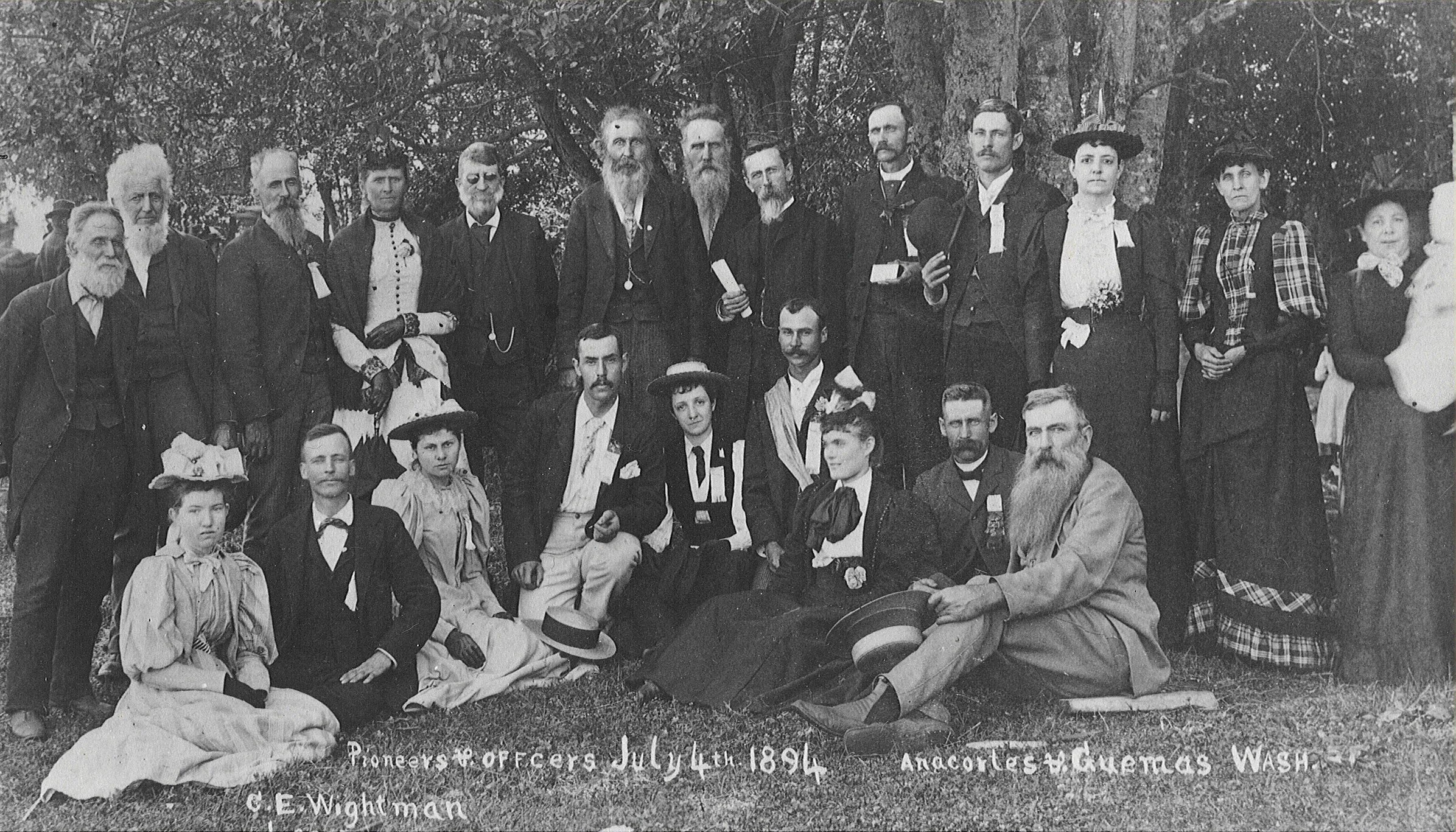  By C.E. Wightman of La Conner of  "Pioneers and Officers, July 4, 1894" on Guemes Island. Names are written on back.  This group picture is of citizens of Anacortes, most of great importance to our history.  Mr. Johnson, Cepheus Woodcock, Mr. and Mr