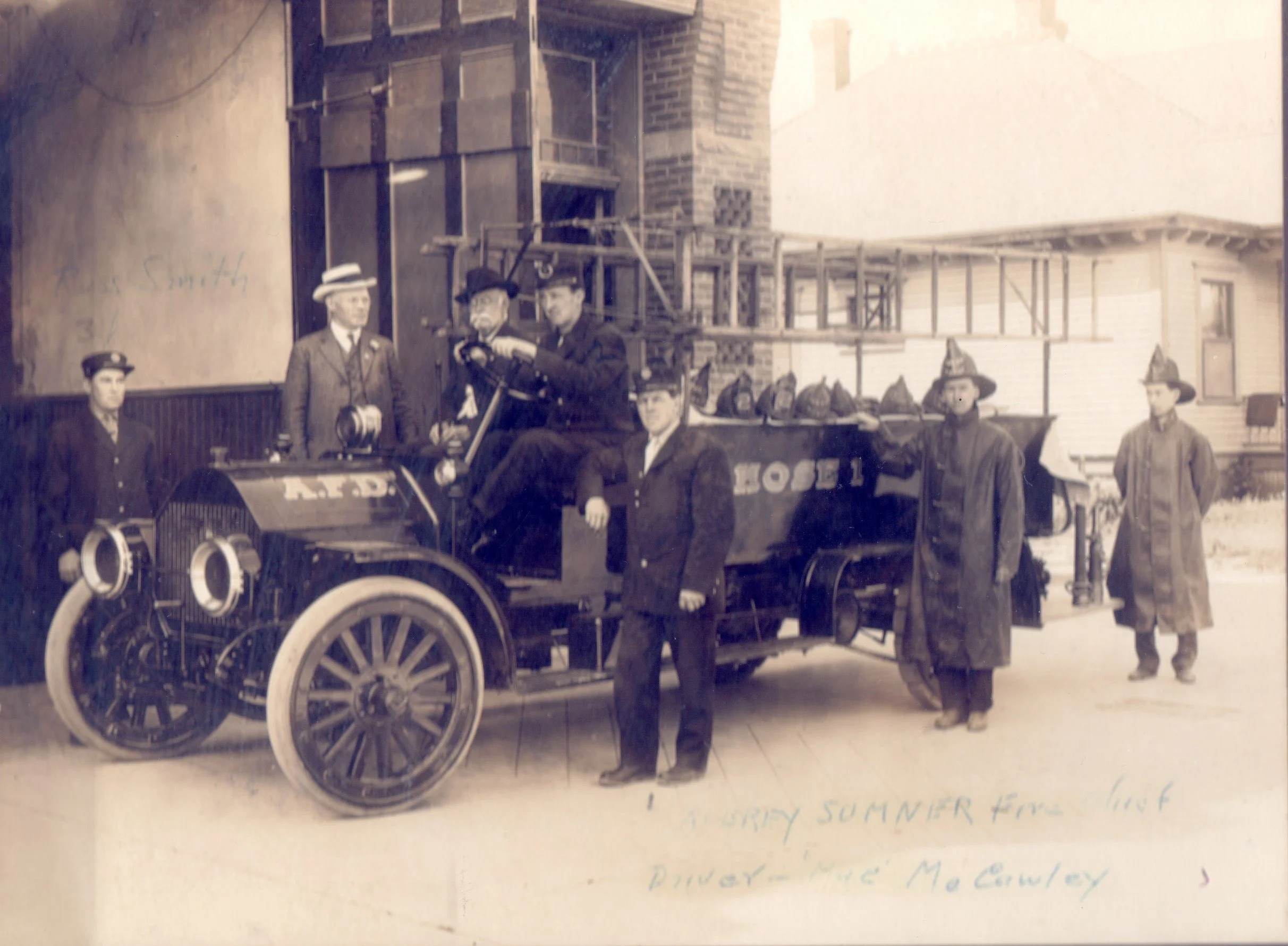  On July 16, 1914, the front page of the ANACORTES AMERICAN featured a photo of the city's first motor powered fire truck.  Left to right:  Russ Smith, first assistant chief, Mayor John M. Morrison, Captain Frank V. Hogan, Blythe "Mac" McCauley, driv