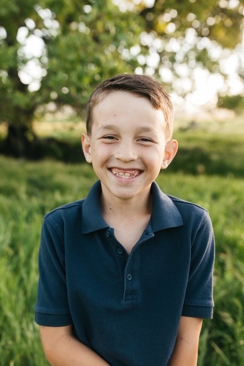 family of four in the beautiful green hills and wildflowers of Marin County by 2024 Cristin More Marin Family Photographer_7.jpg