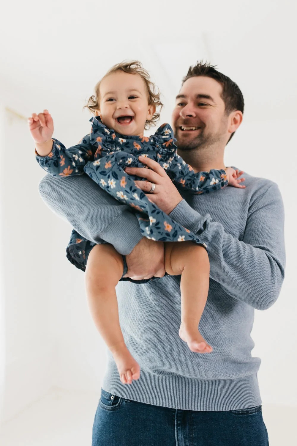 family in blue and cream colors in lifestyle studio by marin family photographer cristin more 2024_12.jpg