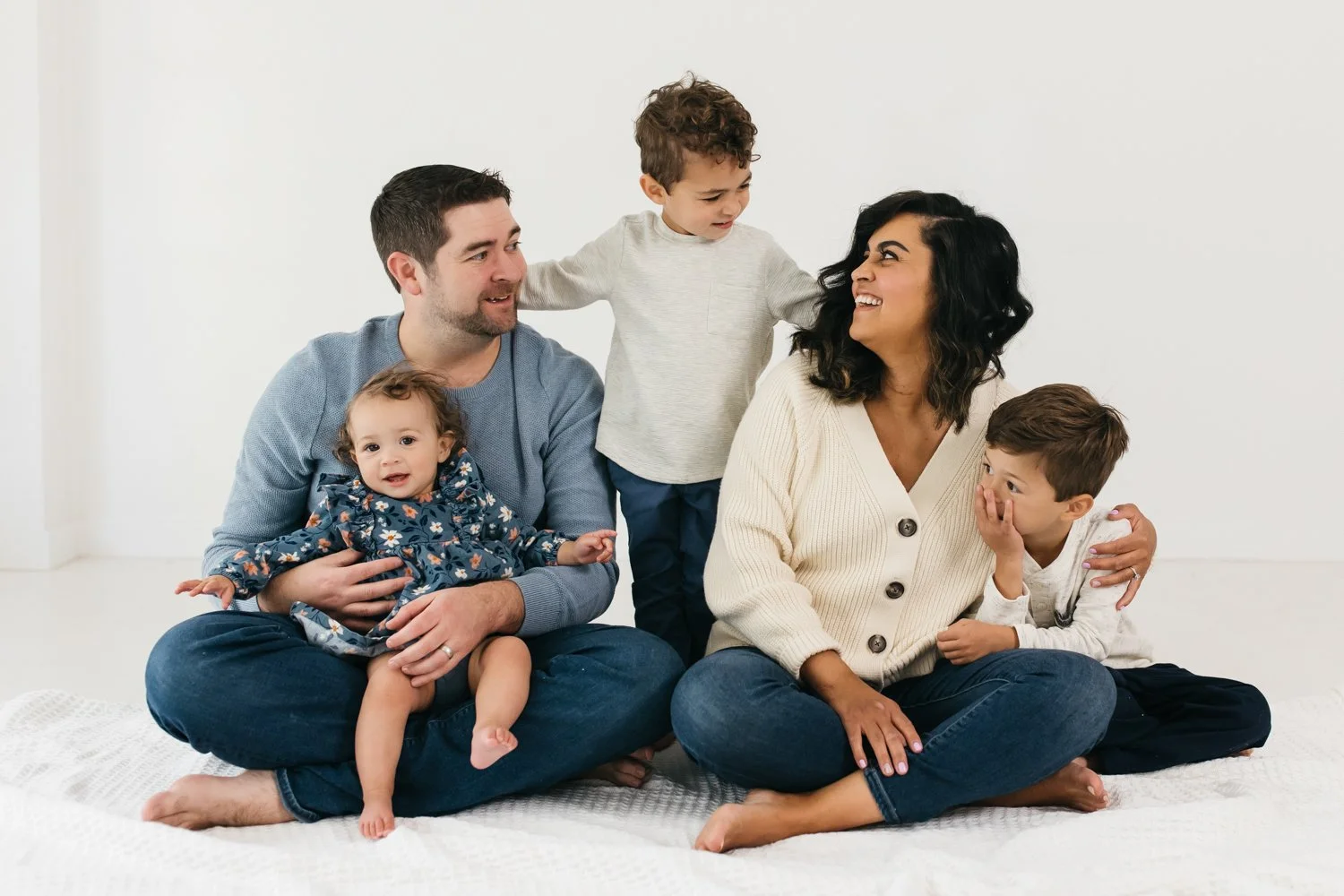 family in blue and cream colors in lifestyle studio by marin family photographer cristin more 2024_11.jpg
