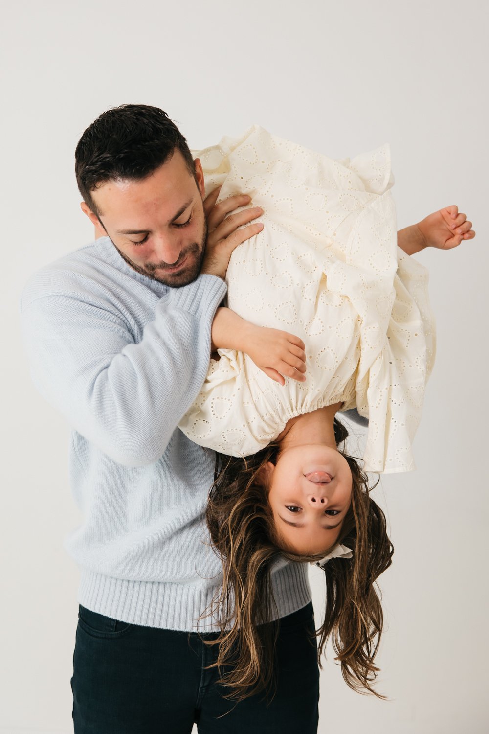 family with two sweet girls yearly photos in marin studio-10.jpg