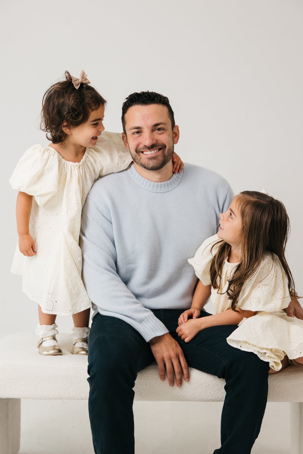 family with two sweet girls yearly photos in marin studio-12.jpg