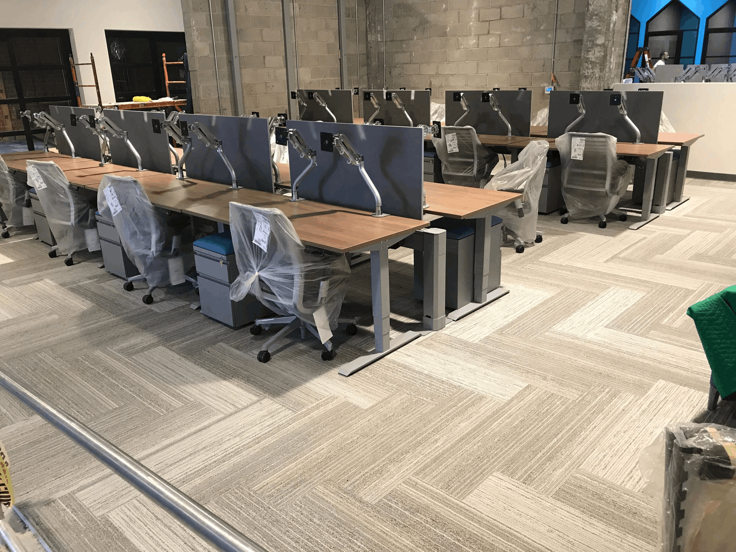 Carpet tile installed in a herringbone pattern