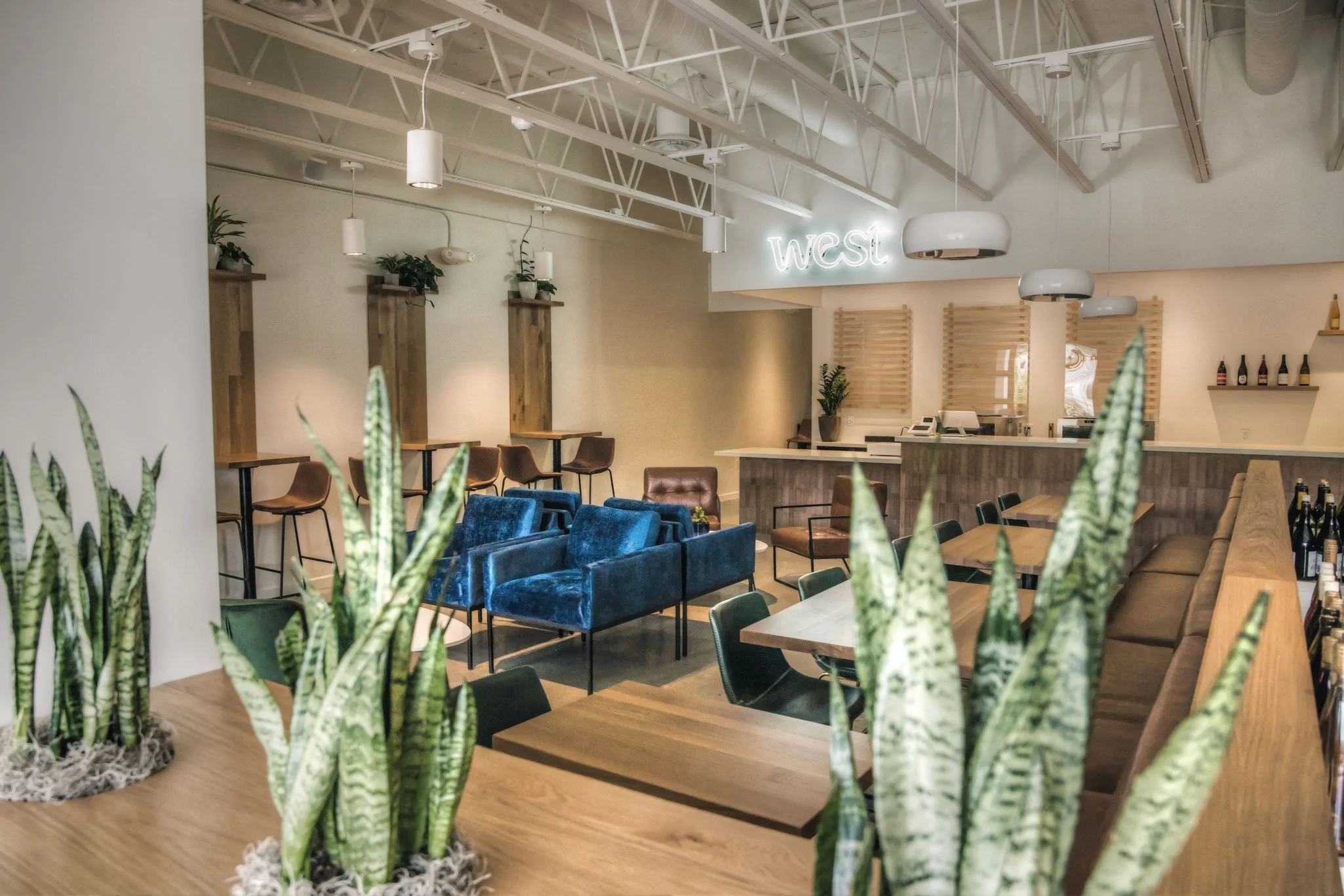 Interior of West Tasting Room in Thousand Oaks, CA, with restaurant flooring by Howard's Rug Company of Ventura