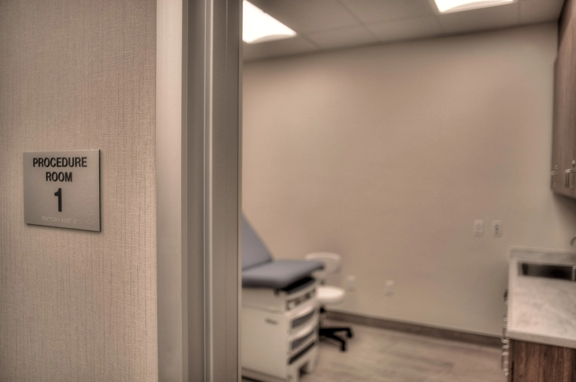 Procedure room at Community Memorial Health SBU Clinic in Ventura, CA, with healthcare flooring by Howard's Rug Company of Ventura