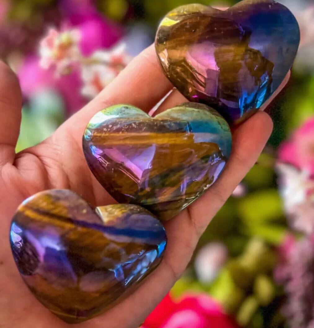 Aura Gold Tigers Eye Hearts &bull; Evoking a feeling of inner strength and courage, our Aura Tigers eye Hearts draw on the ancient wisdom of the divine to reconnect you with all that makes life extraordinary. These spheres of power capture the essenc