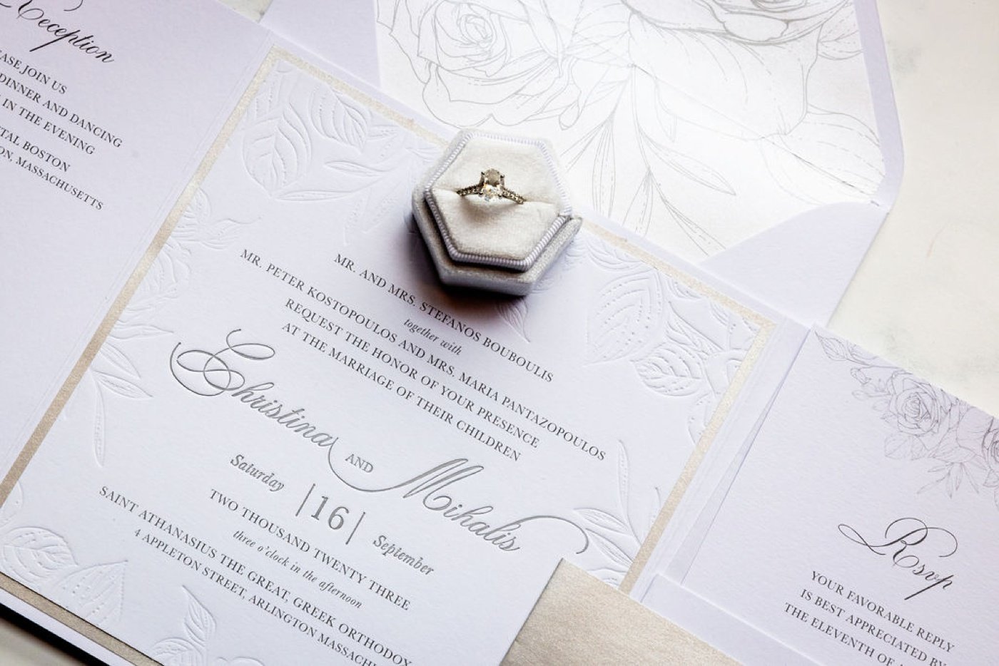 Elegant wedding invitation with embossed roses for a Boston wedding