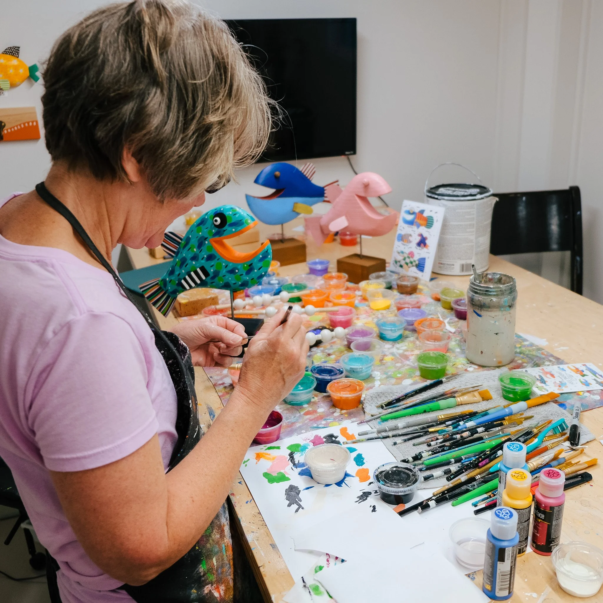 Local Artist Shelly Drews painting in her home studio in Traverse City Michigan, unique Michigan Art Galleries, Local Michigan Artist, Leelanau County Artist, Traverse City Art Gallery