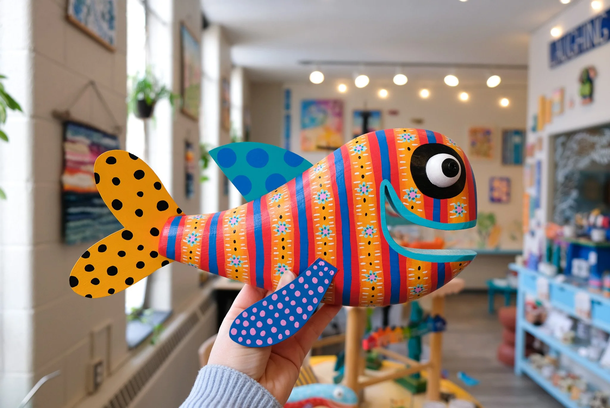 Wooden Fish Art Gallery in Traverse City Michigan, Things to do in Traverse City MI, Happy Art Gallery in Northern Michigan