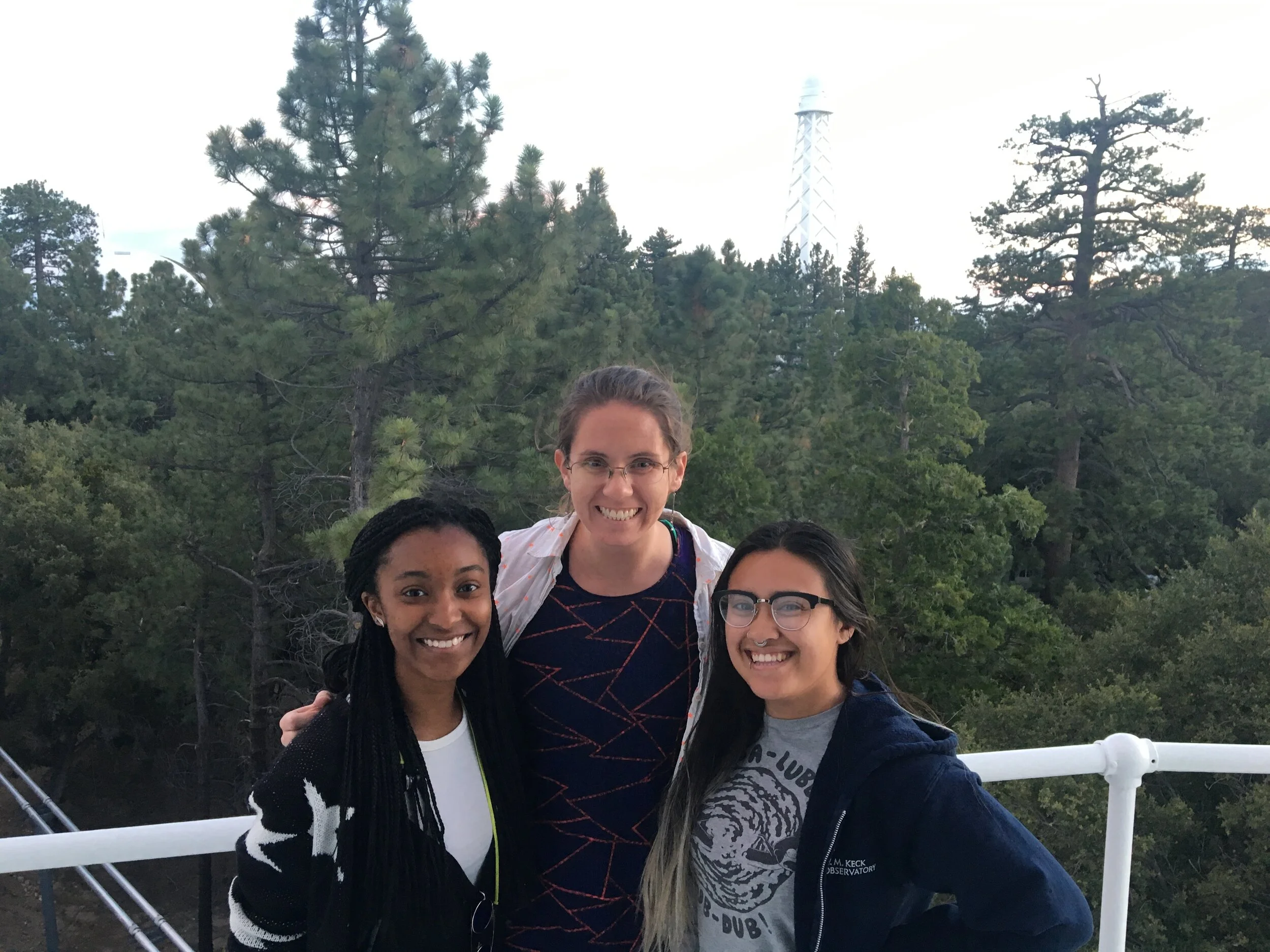 From left to right, Erin, me, and Stephanie during our trip to Mt. Wilson with Upward Bound high school students in July 2018. This photo was taken on the catwalk of the 100'' Telescope, where Edwin Hubble made some of the most influential discoveri…