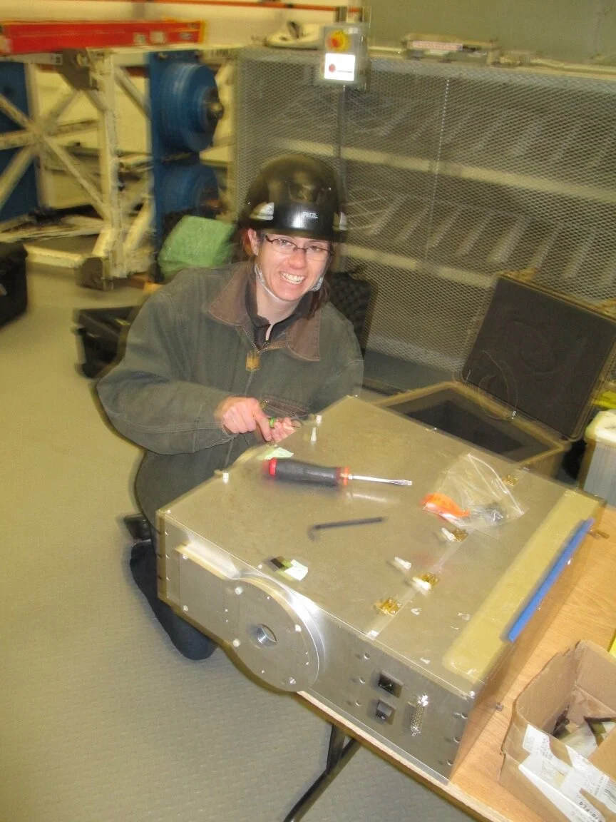 Blurry photo of me working in Gemini's dome to assemble and mount DSSI in July 2014.