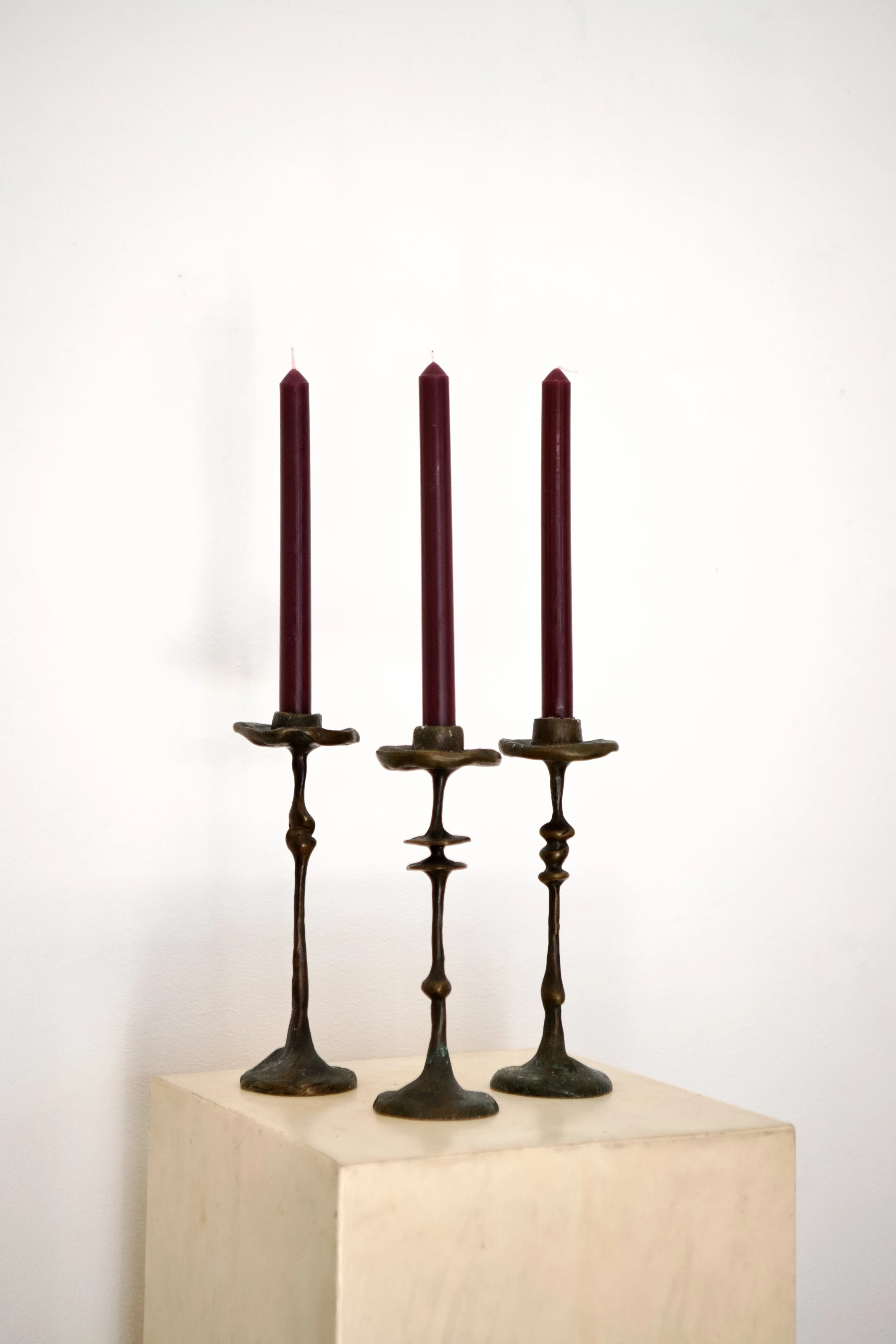 SOLD Trio of Bronze Candlesticks