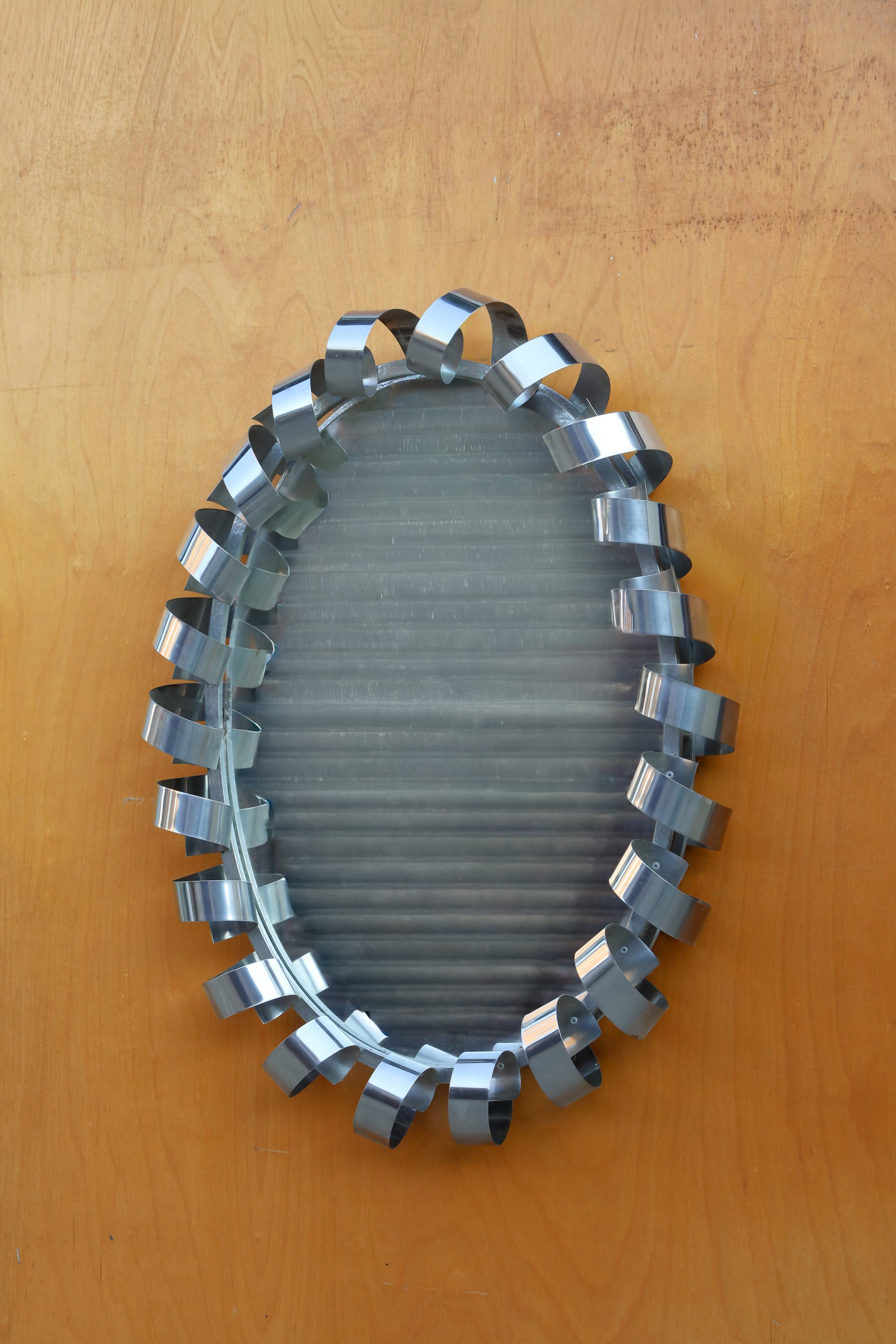 Scrolling Steel Mirror