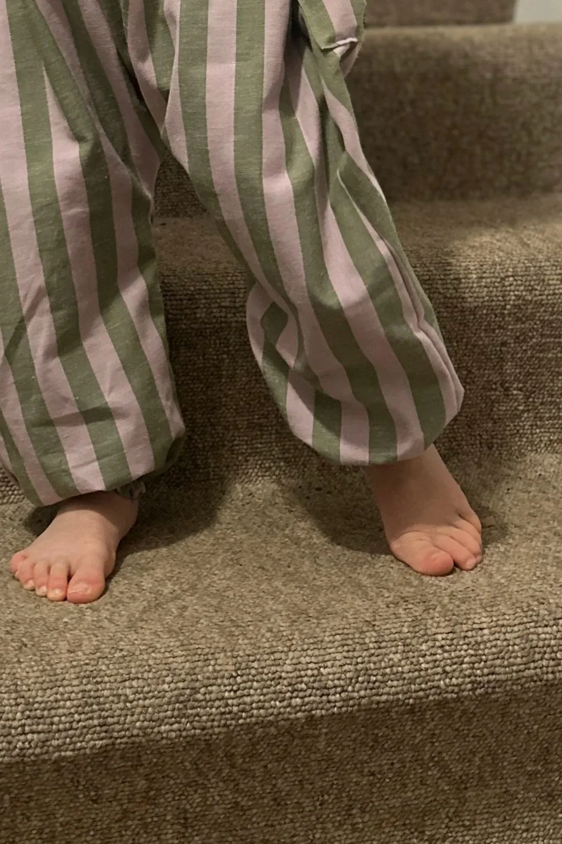 close up organic cotton and linen wide stripe Olive green and lilac