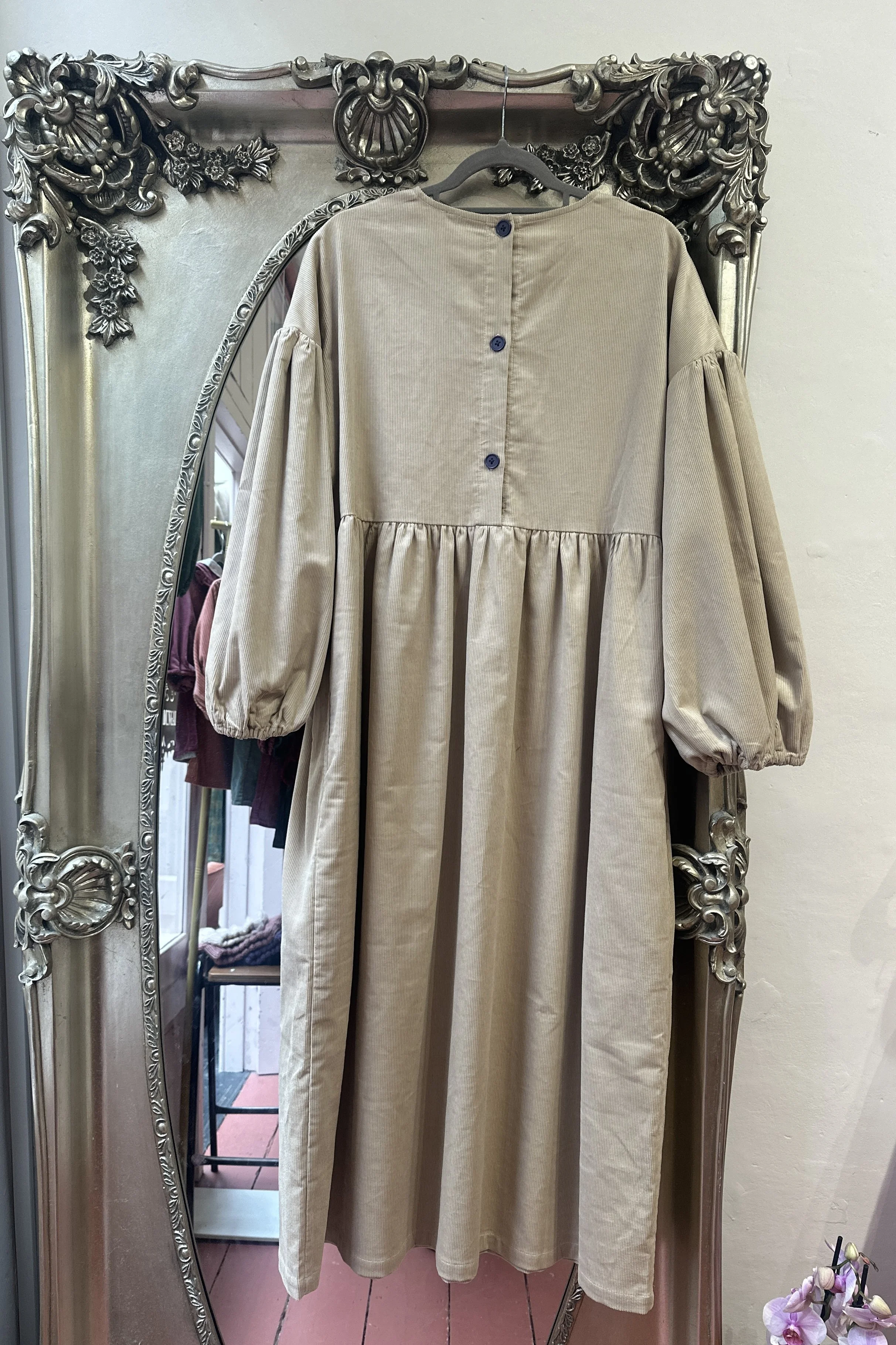 back view of hanging Adult Latte Corduroy Maxi Dress