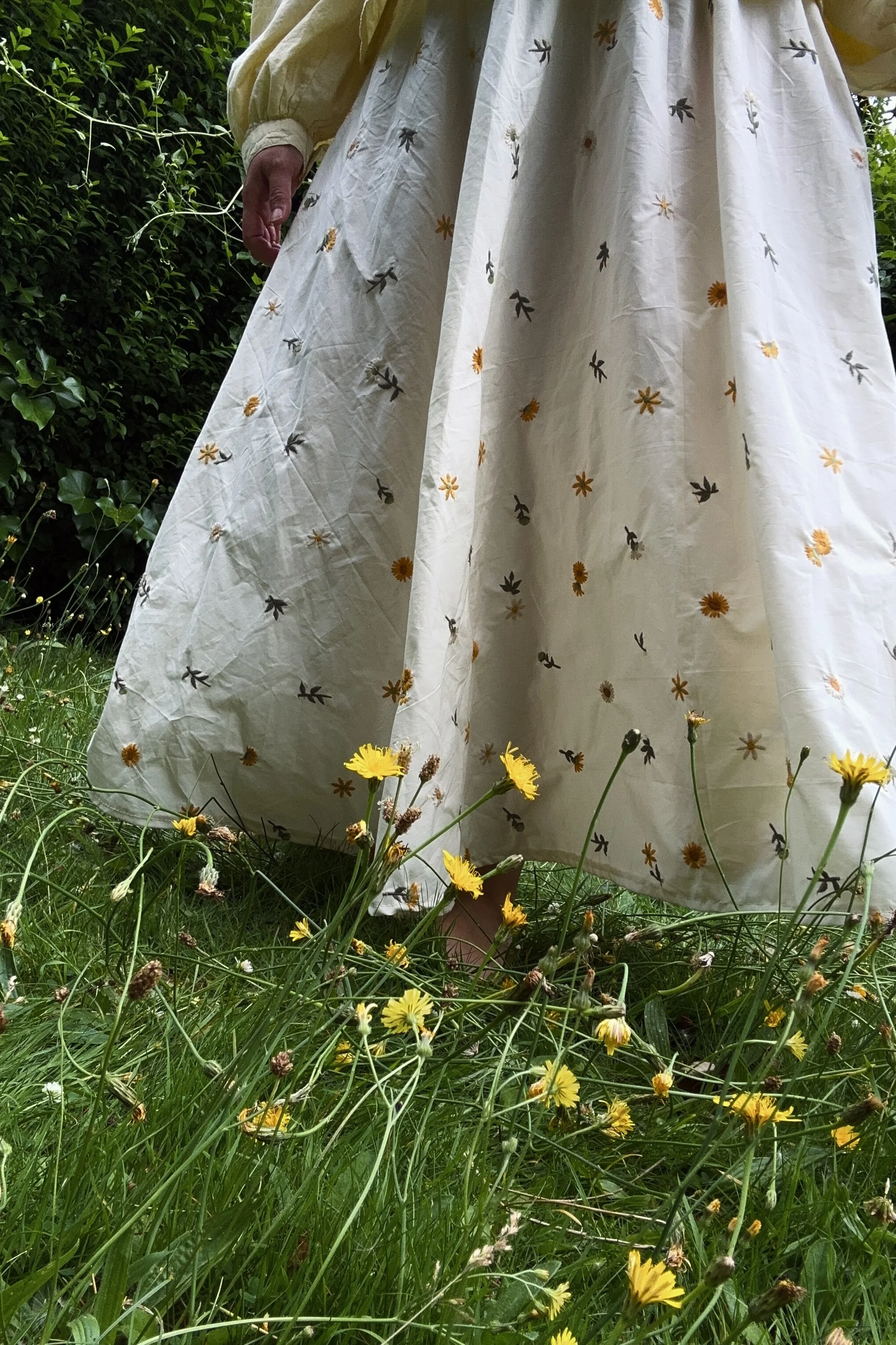 close up Organic Cotton white embroidered dandelion maxi skirt