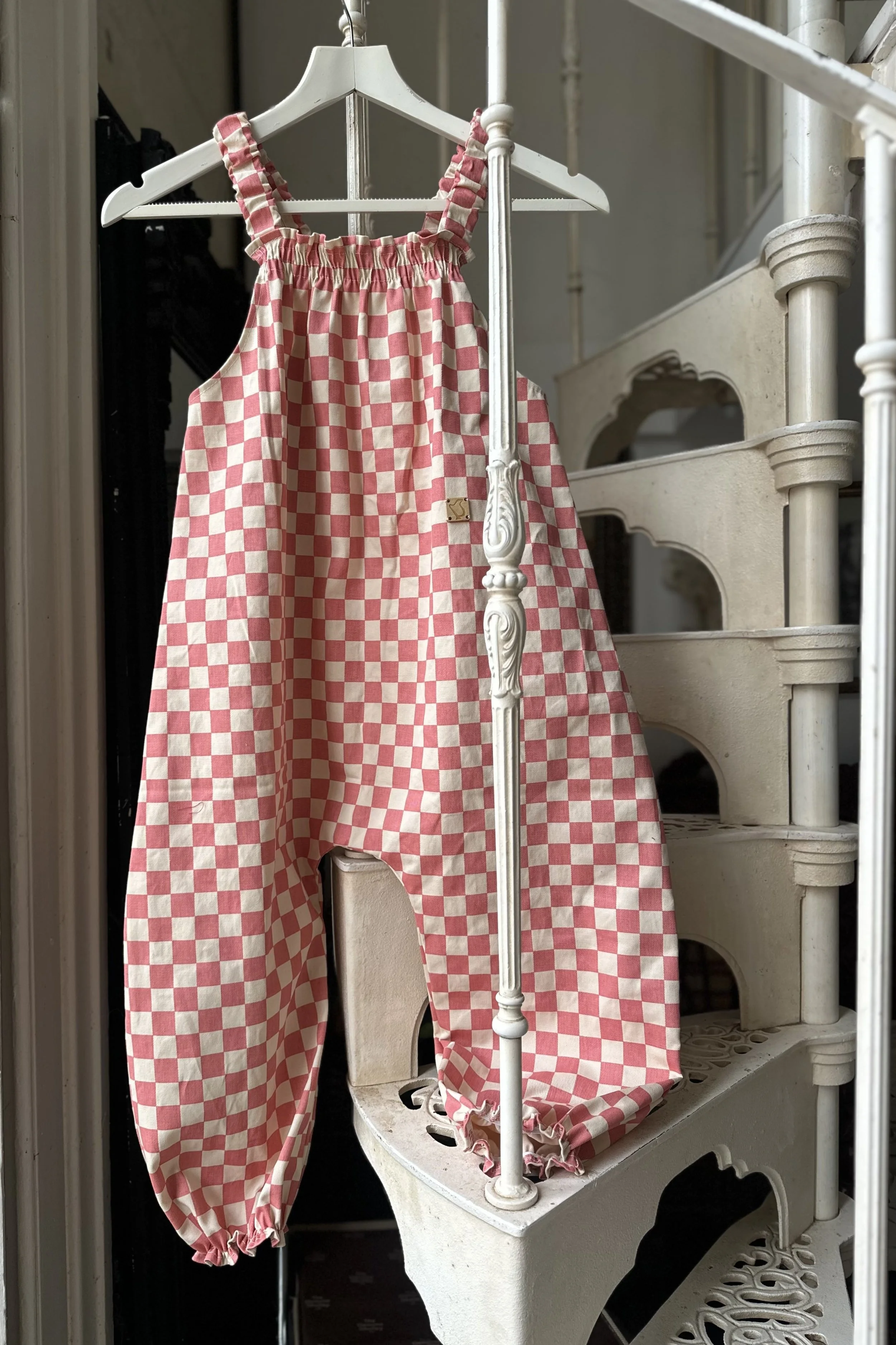 hanging front of organic cotton pullover dungarees in pink