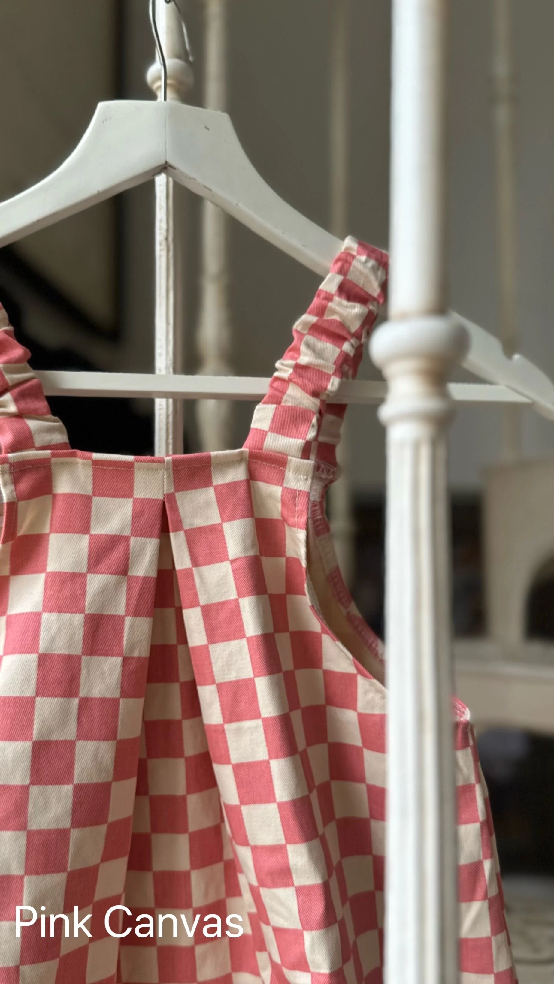 hanging organic cotton pullover dungarees pink canvas highlighting back