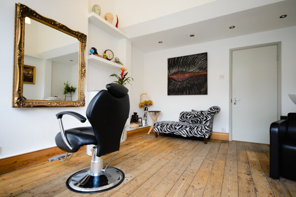 Interior of funky hairdressers in South London