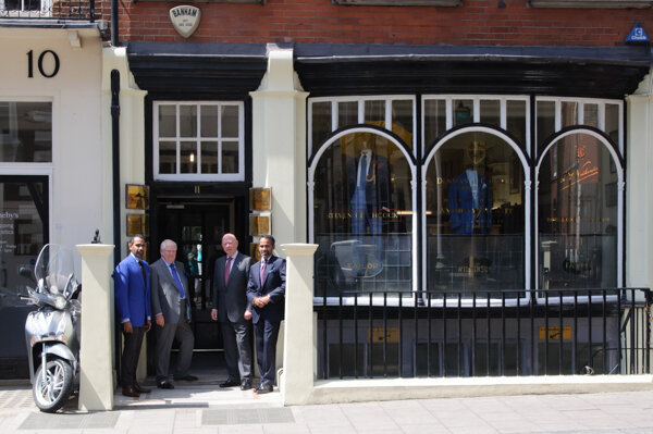 Savile Row brand photography: owners and tailors outside premises