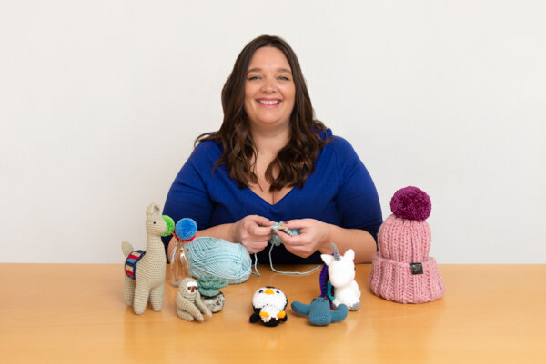 Brand image of woman with her crocheted creations at headshot photography session in London